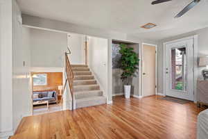 Entrance foyer featuring light hardwood / wood-style flooring