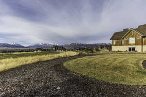 View of yard with a mountain view