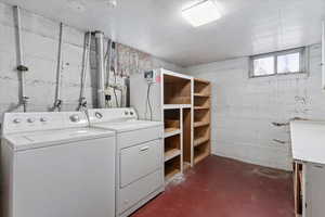 Laundry room featuring washing machine and dryer