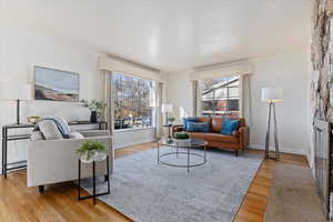 Living room with light hardwood / wood floors