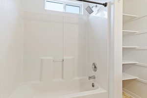 Bathroom featuring shower / bathing tub combination