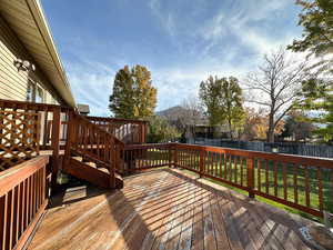 Deck featuring a lawn