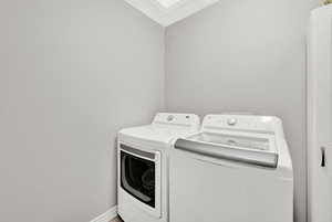 Laundry room with washer and dryer