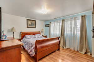 Bedroom featuring light hardwood / wood-style floors