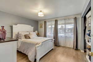 Bedroom featuring light wood-type flooring