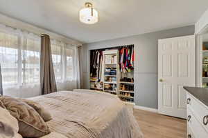 Bedroom featuring light wood-type flooring