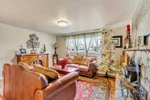 Living room with light wood-type flooring