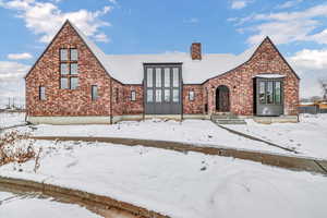 View of english style home