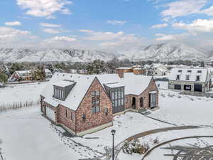 Snowy aerial view with a mountain view