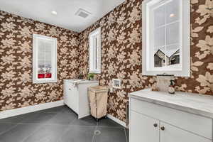 Bathroom featuring tile patterned floors