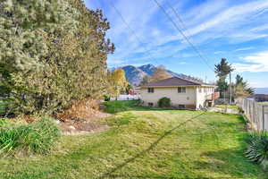 View of yard with a mountain view