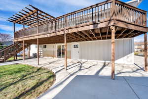 View of patio with a pergola and a deck