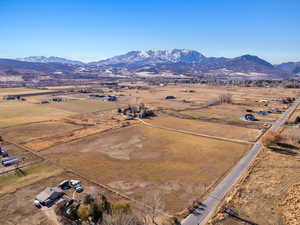 Drone / aerial view featuring a mountain view and a rural view