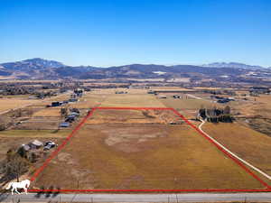 Aerial view with a mountain view and a rural view