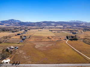 Drone / aerial view featuring a mountain view and a rural view