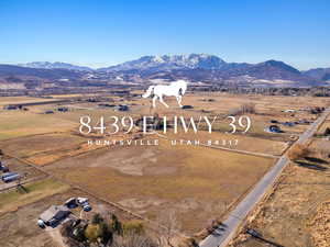 Aerial view with a mountain view and a rural view