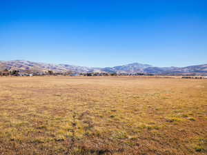 Property view of mountains featuring a rural view