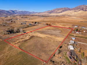 Drone / aerial view with a mountain view and a rural view