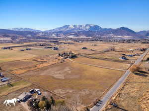 Aerial view featuring a mountain view and a rural view