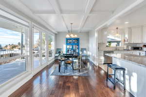 Dining room with beamed ceiling and amazing views