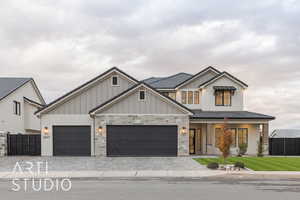 View of front of property featuring a garage