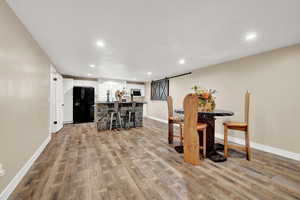 Dining room featuring light hardwood / wood-style flooring