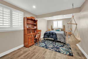 Bedroom with light wood-type flooring