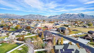 Birds eye view of property with a mountain view