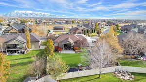 Birds eye view of property with a mountain view