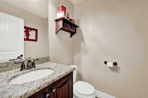 Bathroom with vanity and toilet