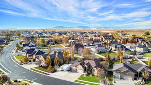 Birds eye view of property with a mountain view