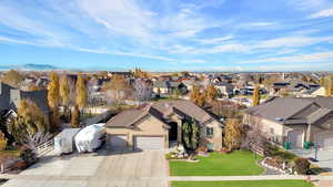 Birds eye view of property with a mountain view