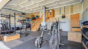 Exercise room with a workshop area