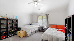 Bedroom featuring carpet floors and ceiling fan