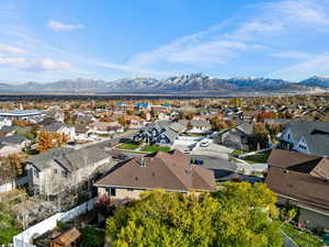 Birds eye view of property with a mountain view