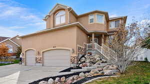 View of front of home featuring a garage