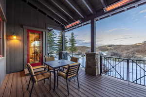 Wooden terrace featuring a mountain view