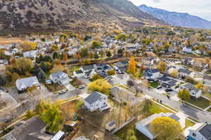 Birds eye view of property with a mountain view