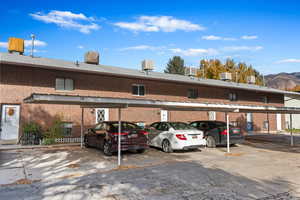 View of car parking with a mountain view