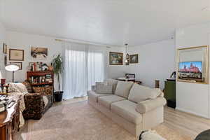 Living room with light wood-type flooring