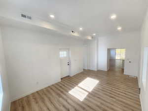 Empty room featuring light hardwood / wood-style floors