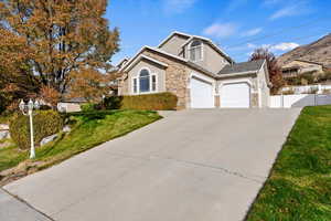 Front facade featuring a front lawn