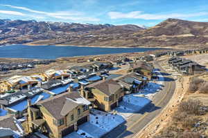 Aerial view featuring a water and mountain view