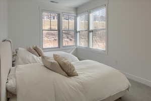 Bedroom featuring carpet flooring