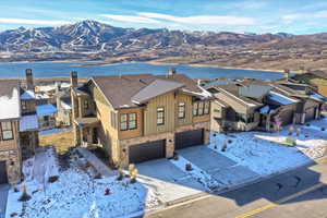 Snowy aerial view with a mountain view