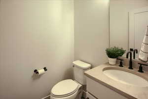 Bathroom with vanity and toilet