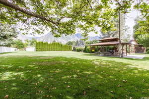 View of yard featuring a gazebo and a mountain view