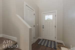 Entryway featuring dark hardwood / wood-style flooring