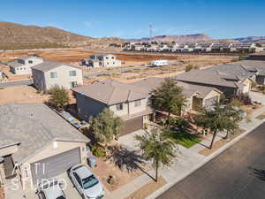 Birds eye view of property with a mountain view