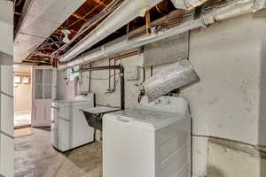 Clothes washing area with washer and dryer